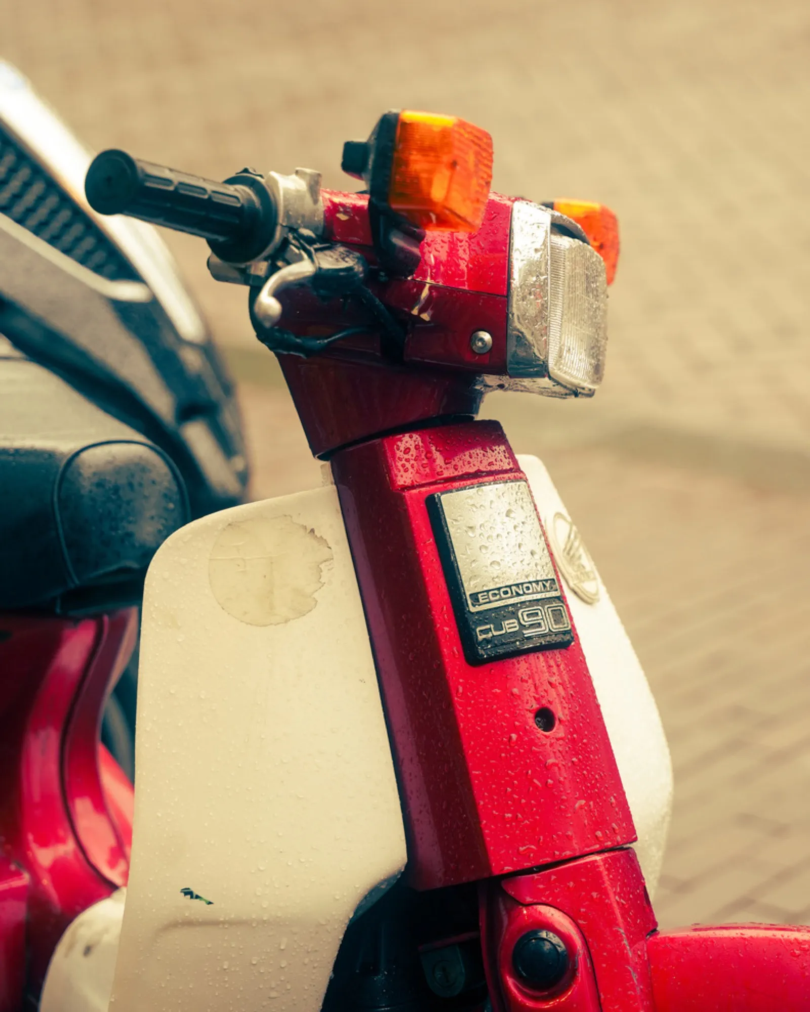 Red and white vintage Vespa scooter detail
