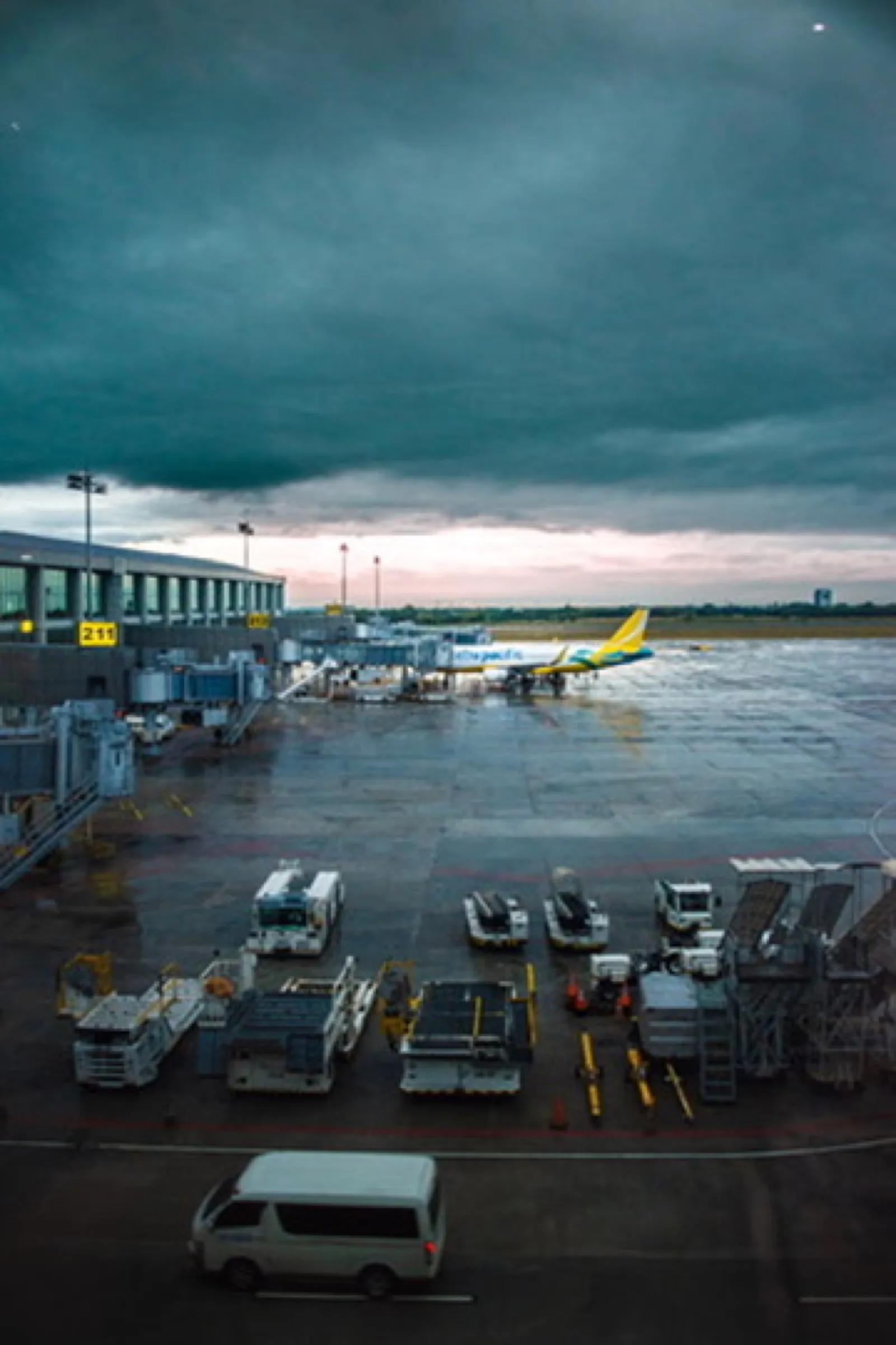 Airport terminal with aircraft at gate