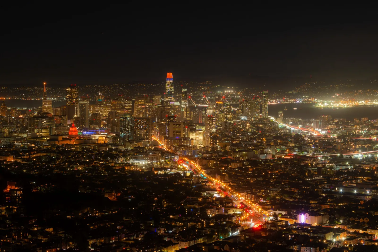 City lights at night with illuminated skyline