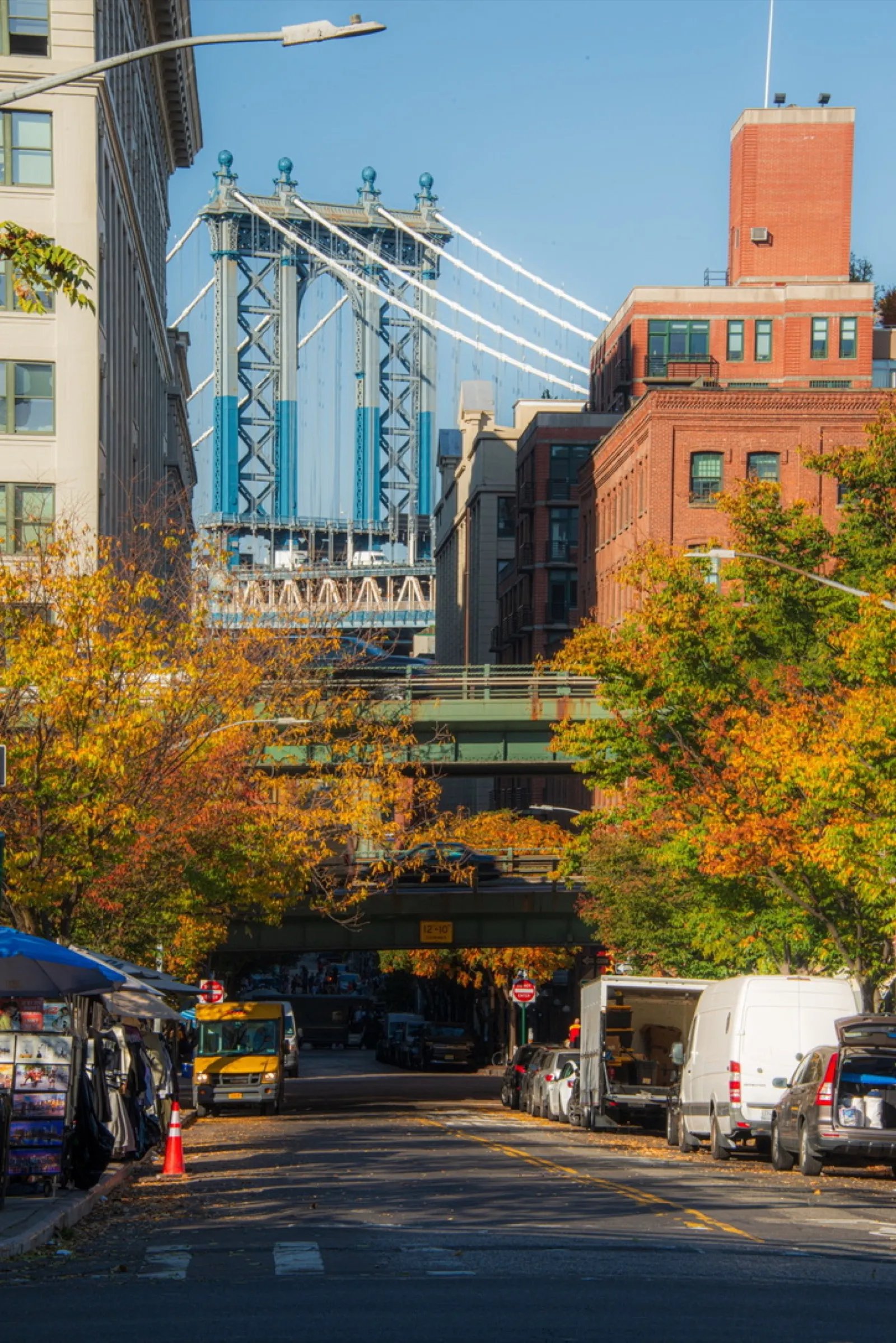 Bridge with orange-red brick building in foreground