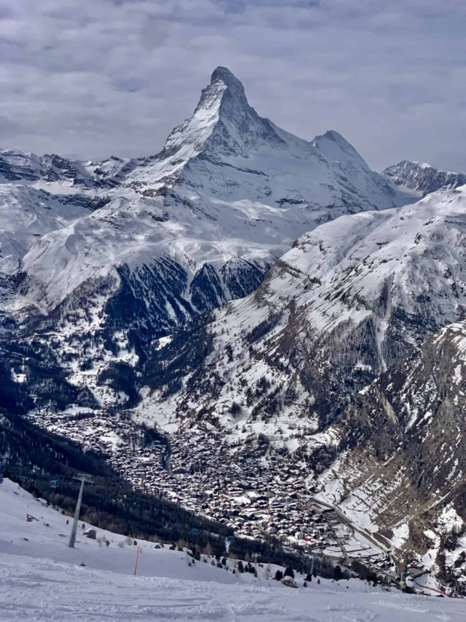 Aerial view of snowy valley and Matterhorn peak